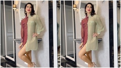 Sunny further accessorised her look in golden earrings from Rubans Jewellery and transparent stilettos. (Instagram/@sunnyleone) Sunny further accessorised her look in golden earrings from Rubans Jewellery and transparent stilettos. (Instagram/@sunnyleone)