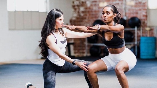 Consider hiring a professional: If you're not sure where to start, consider hiring a professional trainer who can help you create a routine that's tailored to your goals and fitness level.(Pinterest)