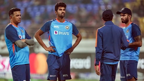 Indian cricket coach Rahul Dravid with Indian players Washington Sundar and Jitesh Sharma(PTI)