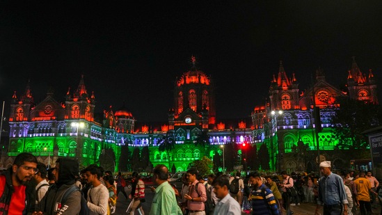 Chhatrapati Shivaji Maharaj Terminus is illuminated in the colours of Tricolour on the eve of Republic Day celebrations, in Mumbai.(PTI)