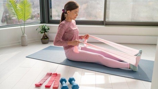 Use resistance bands: Resistance bands are versatile pieces of equipment that can be used to work for multiple muscle groups. They are lightweight and portable, making them perfect for at-home workouts.(Pinterest)