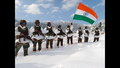 Baramulla, Jan 26 (ANI): Army personnel waves the National Flag at the snow capped mountain of Duniwar on the 74th Republic Day, at Rafiabad, in Baramulla on Thursday. (ANI Photo) (Indian Army) Baramulla, Jan 26 (ANI): Army personnel waves the National Flag at the snow capped mountain of Duniwar on the 74th Republic Day, at Rafiabad, in Baramulla on Thursday. (ANI Photo) (Indian Army)