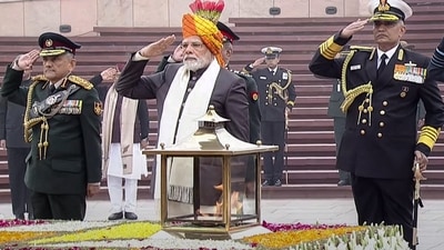 Prime Minister Narendra Modi with Chief of Defence Staff General Anil Chauhan and Chief of Naval Staff Admiral R Hari Kumar pays homage at the National War Memorial on the occasion of 74th Republic Day in New Delhi. (PTI) Prime Minister Narendra Modi with Chief of Defence Staff General Anil Chauhan and Chief of Naval Staff Admiral R Hari Kumar pays homage at the National War Memorial on the occasion of 74th Republic Day in New Delhi. (PTI)