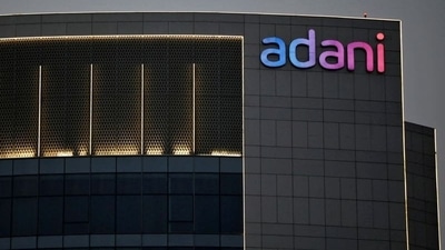 The logo of the Adani Group is seen on the facade of one of its buildings on the outskirts of Ahmedabad. (Reuters)