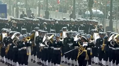 Brass band of the Indian Navy comprising 80 musicians play 'Jai Bharti' while marching down Kartavya Path. (ANI) 