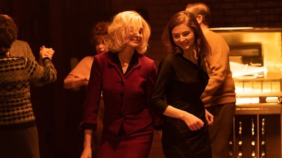 Thomasin McKenzie and Anne Hathaway in a still from Eileen.