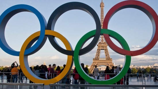 FILE - The Olympic rings are set up at Trocadero plaza that overlooks the Eiffel Tower, a day after the official announcement that the 2024 Summer Olympic Games will be in the French capital, in Paris, Thursday, Sept. 14, 2017. The budget for the 2024 Paris Olympics is expected to go up by 10%, in part because of high inflation, organizers said Tuesday, Nov.22, 2022. The organizing committee, known as COJO, had an original budget of around 4 billion euros ($4.1 billion) but will present a revised figure at a board meeting next month that is expected to reach 4.4 billion euros ($4.5 billion). (AP Photo//Michel Euler, File)(AP) FILE - The Olympic rings are set up at Trocadero plaza that overlooks the Eiffel Tower, a day after the official announcement that the 2024 Summer Olympic Games will be in the French capital, in Paris, Thursday, Sept. 14, 2017. The budget for the 2024 Paris Olympics is expected to go up by 10%, in part because of high inflation, organizers said Tuesday, Nov.22, 2022. The organizing committee, known as COJO, had an original budget of around 4 billion euros ($4.1 billion) but will present a revised figure at a board meeting next month that is expected to reach 4.4 billion euros ($4.5 billion). (AP Photo//Michel Euler, File)(AP)
