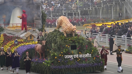 The making of a 'Naya Jamma and Kashmir' and ancient Amarnath cave shrine are the main themes of the Jammu and Kashmir Republic Day tableau that rolled down the Kartavya Path amid patriotic fervour at the ceremonial boulevard.(AP)