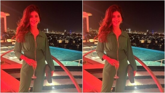 Sanjana looked like a million bucks in the green jumpsuit featuring long sleeves, collars, a zip running through her torso, and ruched details at the waist. The jumpsuit also featured pleat details at the ankles.&nbsp;(Instagram/@sanjanasanghi96)