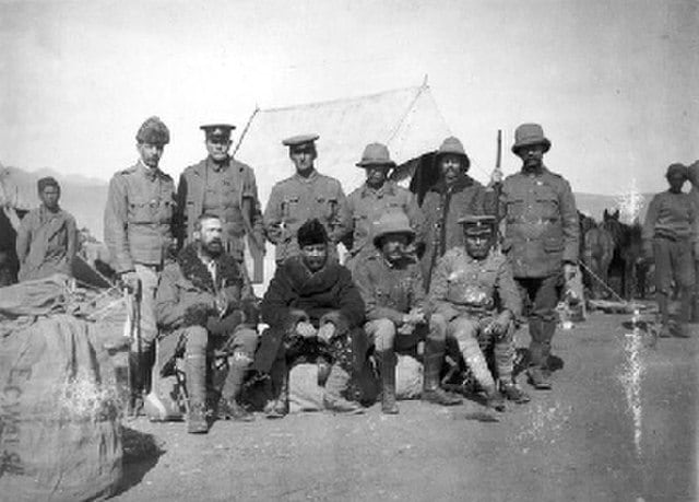 The British expedition to Tibet, also known as the Younghusband expedition, which began in December 1903 and lasted until September 1904. The original caption reads: “Ray, O’Connor, Dunlop, Igybilden, Col Hogge, Waddell, Walsh, Younghusband, GOC, Brotherton, the staff and others at Phari Jong in January 1904.” (Wikimedia Commons) The British expedition to Tibet, also known as the Younghusband expedition, which began in December 1903 and lasted until September 1904. The original caption reads: “Ray, O’Connor, Dunlop, Igybilden, Col Hogge, Waddell, Walsh, Younghusband, GOC, Brotherton, the staff and others at Phari Jong in January 1904.” (Wikimedia Commons)
