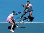 India's Rohan Bopanna and Sania Mirza in the mixed doubles final against Brazil's Luisa Stefani and Rafael Matos at the Australian Open tennis championship in Melbourne, Australia, Friday, Jan. 27, 2023. (AP Photo/Ng Han Guan)(AP) India's Rohan Bopanna and Sania Mirza in the mixed doubles final against Brazil's Luisa Stefani and Rafael Matos at the Australian Open tennis championship in Melbourne, Australia, Friday, Jan. 27, 2023. (AP Photo/Ng Han Guan)(AP)