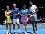 Brazil's Luisa Stefani and Rafael Matos pose with the trophy after their victory against India's Sania Mirza and Rohan Bopanna during the mixed doubles final on day twelve of the Australian Open tennis tournament in Melbourne on January 27, 2023. (AFP) Brazil's Luisa Stefani and Rafael Matos pose with the trophy after their victory against India's Sania Mirza and Rohan Bopanna during the mixed doubles final on day twelve of the Australian Open tennis tournament in Melbourne on January 27, 2023. (AFP)