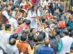 AAP and BJP Delhi councillors shout slogans during the oath ceremony at the MCD Civic Centre in New Delhi on January 24. (Raj K Raj/HT Photo) AAP and BJP Delhi councillors shout slogans during the oath ceremony at the MCD Civic Centre in New Delhi on January 24. (Raj K Raj/HT Photo)