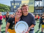 Thijs van Dam with partner Pien Sanders