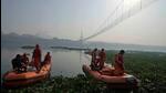 The bridge, after undergoing repairs, was thrown open for public on Oct 26 and it collapsed on Oct 30. (AP image) The bridge, after undergoing repairs, was thrown open for public on Oct 26 and it collapsed on Oct 30. (AP image)