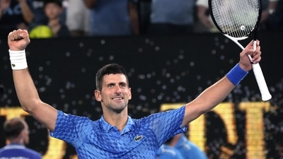 Novak Djokovic of Serbia celebrates after defeating Tommy Paul of the U.S. in their semifinal at the Australian Open tennis championship in Melbourne, Australia, Friday, Jan. 27, 2023. (AP Photo/Aaron Favila) (AP) Novak Djokovic of Serbia celebrates after defeating Tommy Paul of the U.S. in their semifinal at the Australian Open tennis championship in Melbourne, Australia, Friday, Jan. 27, 2023. (AP Photo/Aaron Favila) (AP)