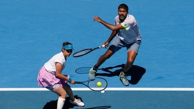 India's Rohan Bopanna and Sania Mirza in the mixed doubles final against Brazil's Luisa Stefani and Rafael Matos at the Australian Open tennis championship in Melbourne, Australia, Friday, Jan. 27, 2023. (AP Photo/Ng Han Guan) (AP) India's Rohan Bopanna and Sania Mirza in the mixed doubles final against Brazil's Luisa Stefani and Rafael Matos at the Australian Open tennis championship in Melbourne, Australia, Friday, Jan. 27, 2023. (AP Photo/Ng Han Guan) (AP)