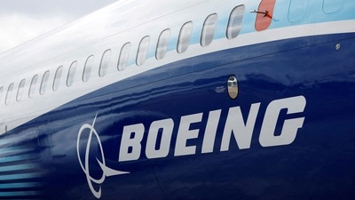 The Boeing logo is seen on the side of a Boeing 737 MAX. (REUTERS)