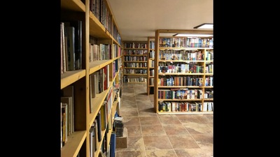 Couple's personal library has 32,000 books. (Twitter/@@GearBooks) Couple's personal library has 32,000 books. (Twitter/@@GearBooks)