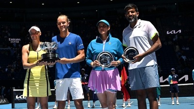 Brazil's Luisa Stefani and Rafael Matos pose with the trophy after their victory against India's Sania Mirza and Rohan Bopanna during the mixed doubles final on day twelve of the Australian Open tennis tournament in Melbourne on January 27, 2023. (AFP) Brazil's Luisa Stefani and Rafael Matos pose with the trophy after their victory against India's Sania Mirza and Rohan Bopanna during the mixed doubles final on day twelve of the Australian Open tennis tournament in Melbourne on January 27, 2023. (AFP)