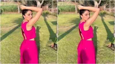 Sobhita looked glam in the sleeveless hot pink jumpsuit featuring midriff-baring patterns and cut-out details at the back. (Instagram/@sobhitad) Sobhita looked glam in the sleeveless hot pink jumpsuit featuring midriff-baring patterns and cut-out details at the back. (Instagram/@sobhitad)