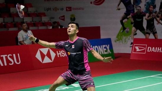 India's Lakshya Sen returns a shot to Japan's Kodai Naraoka during the men's single match in the Indonesia Masters badminton tournament in Jakarta, Indonesia, Wednesday, Jan. 25, 2023. (AP/PTI)(AP01_25_2023_000071A)(AP)
