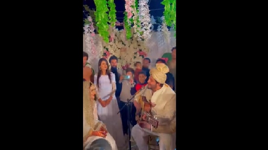 Snippet from viral video of a Pakistani groom singing for his wife at their wedding.(Instagram/@iseharhayat)