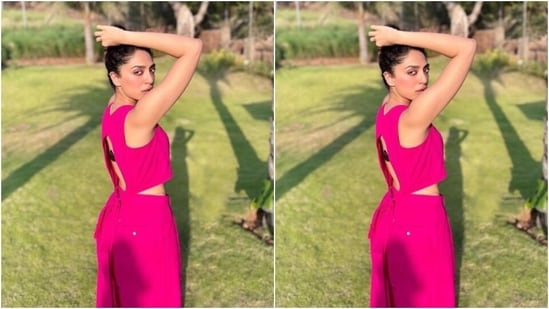 Sobhita looked glam in the sleeveless hot pink jumpsuit featuring midriff-baring patterns and cut-out details at the back.&nbsp;(Instagram/@sobhitad)
