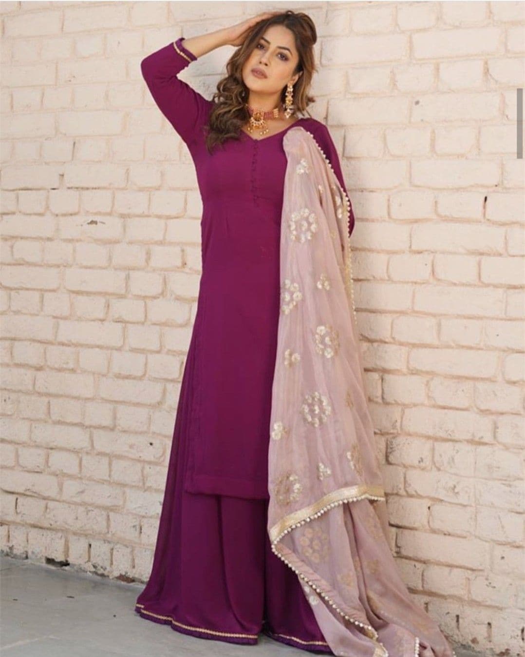 Our Punjabi kudi looks stunning in a purple kurta and palazzo set.(pinterest)