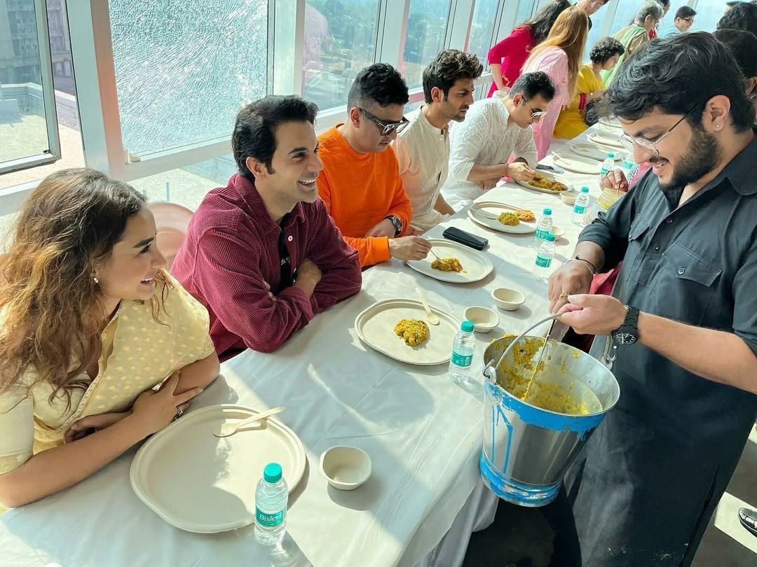 Patralekhaa, Rajkummar Rao and Kartik Aaryan having prasad. Patralekhaa, Rajkummar Rao and Kartik Aaryan having prasad.