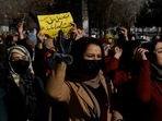Afghan women chant slogans in protest against the closure of universities to women by the Taliban in Kabul, Afghanistan, December 22, 2022. 