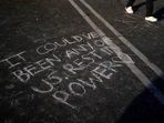 A message is written at a memorial outside Star Dance Studio for the victims killed in last week's mass shooting in Monterey Park, California. (AP) A message is written at a memorial outside Star Dance Studio for the victims killed in last week's mass shooting in Monterey Park, California. (AP)