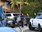 Law enforcement work an investigation after an early morning shooting that left three people dead and four wounded, on January 28, 2023, in the Beverly Crest neighborhood of Los Angeles, just north of Beverly Hills. (Photo by Robyn BECK / AFP)(AFP) Law enforcement work an investigation after an early morning shooting that left three people dead and four wounded, on January 28, 2023, in the Beverly Crest neighborhood of Los Angeles, just north of Beverly Hills. (Photo by Robyn BECK / AFP)(AFP)