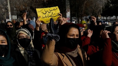 Afghan women chant slogans in protest against the closure of universities to women by the Taliban in Kabul, Afghanistan, December 22, 2022. (REUTERS )
