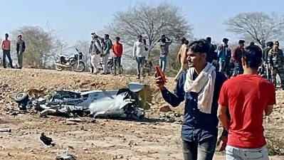 People gather near the wrecked remains after a Sukhoi-30 and Mirage 2000 aircraft crashed near Morena, Madhya Pradesh, on Saturday. (ANI) People gather near the wrecked remains after a Sukhoi-30 and Mirage 2000 aircraft crashed near Morena, Madhya Pradesh, on Saturday. (ANI)