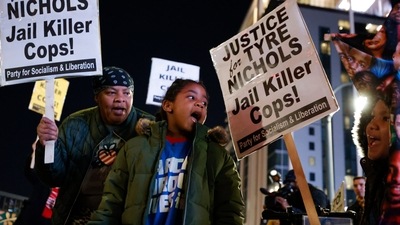 Demonstrators gather during a protest over the death of Tyre Nichols on Friday in Atlanta. (AP)