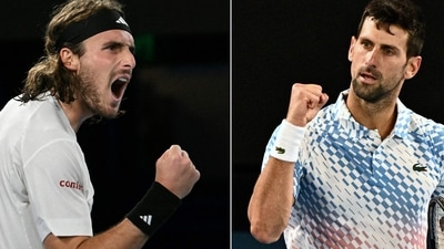 Serbia's Novak Djokovic and Greece's Stefanos Tsitsipas play in the men's singles final match at the Australian Open tennis tournament on January 29. (AFP) Serbia's Novak Djokovic and Greece's Stefanos Tsitsipas play in the men's singles final match at the Australian Open tennis tournament on January 29. (AFP)