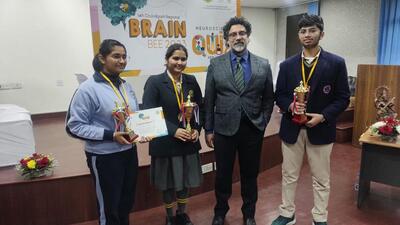 Dr Dheeraj Khurana of the department of neurology, PGIMER, with winners of the 14th regional Brain Bee contest in Chandigarh on Saturday. (HT Photo)