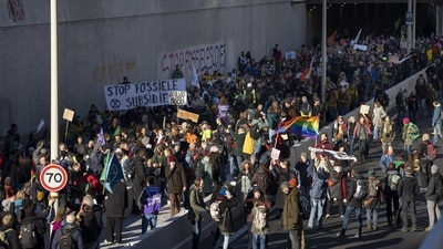 Extinction Rebellion activists and sympathisers block a busy road in The Hague, Netherlands. (AP) Extinction Rebellion activists and sympathisers block a busy road in The Hague, Netherlands. (AP)