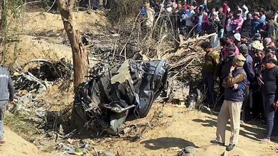 Officials and local administrations visit at the site as suspected wreckage of Sukhoi-30 and Mirage 2000 aircraft that crashed in Morena seen in Bharatpur, on Saturday. (AGENCIES) Officials and local administrations visit at the site as suspected wreckage of Sukhoi-30 and Mirage 2000 aircraft that crashed in Morena seen in Bharatpur, on Saturday. (AGENCIES)