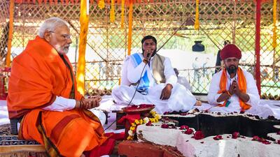 Prime Minister Narendra Modi performs 'puja' during the commemoration of 1111th Avataran Mahotsav of Bhagwan Shri Devnarayan Ji, in Bhilwara, on Saturday. (PTI) Prime Minister Narendra Modi performs 'puja' during the commemoration of 1111th Avataran Mahotsav of Bhagwan Shri Devnarayan Ji, in Bhilwara, on Saturday. (PTI)