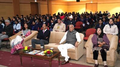 Students and teachers watching the live telecast of Pariksha Pe Charcha at Raj Bhawan, Chandigarh. (HT Phoro)