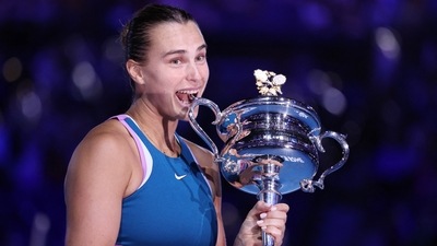 Belarus’ Aryna Sabalenka celebrates with the trophy after winning her final match against Kazakhstan’s Elena Rybakina (REUTERS)