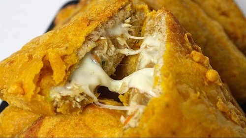 This twist on the classic bread pakoda is packed with flavor, thanks to the addition of grated cheese, onions, and cilantro. (pinterest) This twist on the classic bread pakoda is packed with flavor, thanks to the addition of grated cheese, onions, and cilantro. (pinterest)