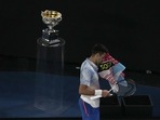 Novak Djokovic of Serbia uses a towel to wipe off his face while playing against Stefanos Tsitsipas of Greece during the men's singles final at the Australian Open(AP) Novak Djokovic of Serbia uses a towel to wipe off his face while playing against Stefanos Tsitsipas of Greece during the men's singles final at the Australian Open(AP)