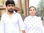 Rakhi Sawant with husband Adil Khan Durrani ahead of her mom's final rites. Rakhi Sawant with husband Adil Khan Durrani ahead of her mom's final rites.