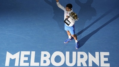 Novak Djokovic of Serbia reacts as he holds the Norman Brookes Challenge Cup after defeating Stefanos Tsitsipas (AP) Novak Djokovic of Serbia reacts as he holds the Norman Brookes Challenge Cup after defeating Stefanos Tsitsipas (AP)
