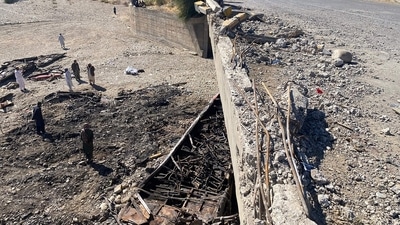 “The accident happened due to over-speeding and the bus crashed into the pillar of a bridge. It caught fire soon after falling (off the bridge),” he said. (AFP) “The accident happened due to over-speeding and the bus crashed into the pillar of a bridge. It caught fire soon after falling (off the bridge),” he said. (AFP)