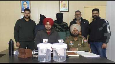 The accused in the custody of the anti-narcotics-cum-special operation cell of Mohali police. (HT Photo) The accused in the custody of the anti-narcotics-cum-special operation cell of Mohali police. (HT Photo)