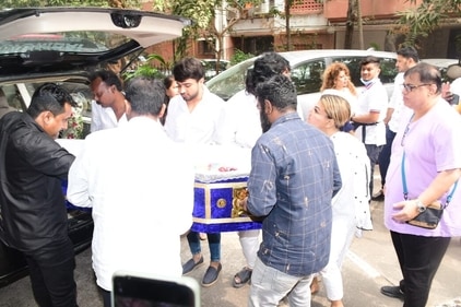 Adil Khan, Rakhi Sawant and Rakesh Sawant during her mom's final rites. (Varinder Chawla) Adil Khan, Rakhi Sawant and Rakesh Sawant during her mom's final rites. (Varinder Chawla)